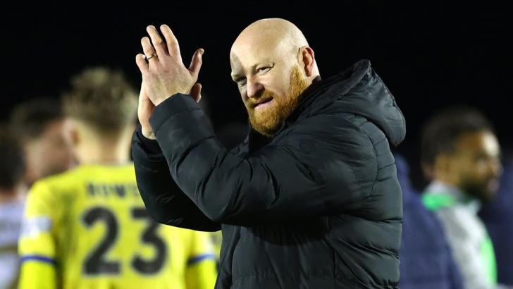 Solihull Moors boss Andy Whing applauds the fans after the game